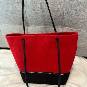 Red purse handcrafted by Material Things